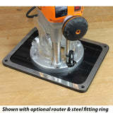 Router attached to steel router table insert plate on a woodworking benchtop