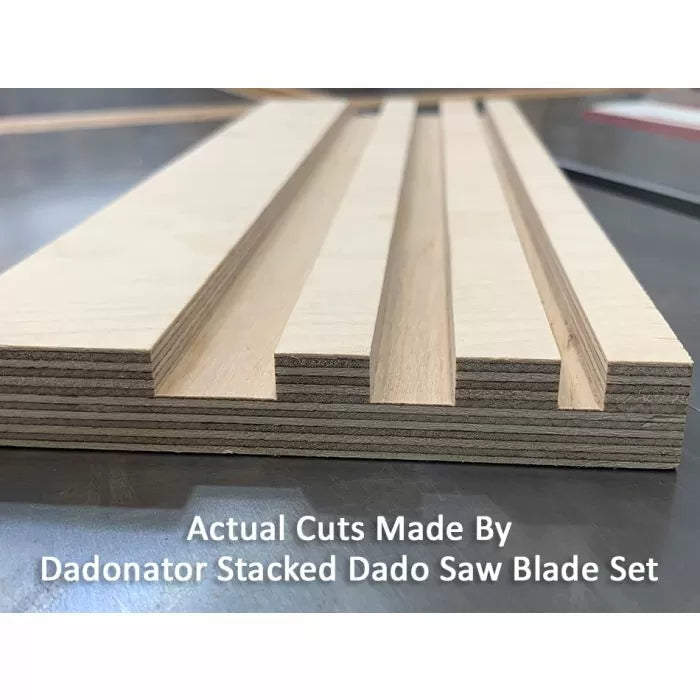 Close-up of plywood with clean dado grooves cut by stacked dado saw blade set on workbench.