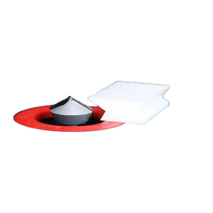Router bit set with red base and white sample board for woodworking projects