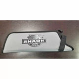 Gray Shark Corp saw sheath with black trim on dark wood surface, protective tool case.