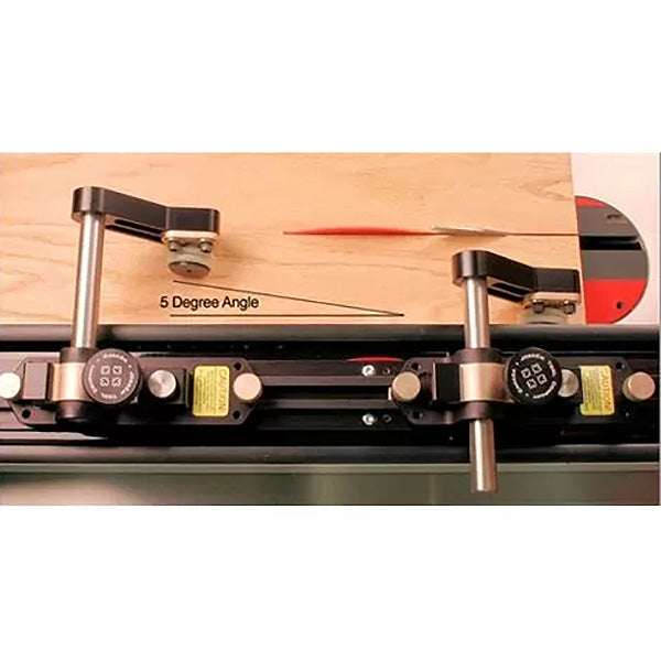 Table saw featherboard jig set at 5 degree angle with wood piece on saw top