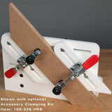 Woodworking jig with accessory clamping kit securing a board on a workbench